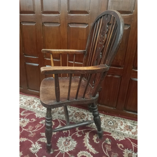 953 - Oak Windsor spindle armchair{H 100cm x W 53cm x D 50cm }. { not on site for viewing }.