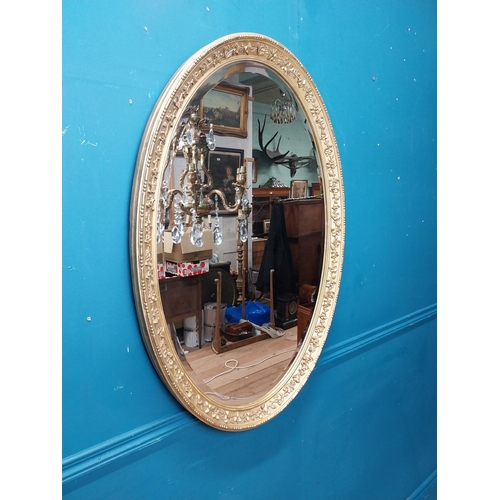 956 - 19th C. gilt oval wall mirror. {96 cm H x 68 cm W}.