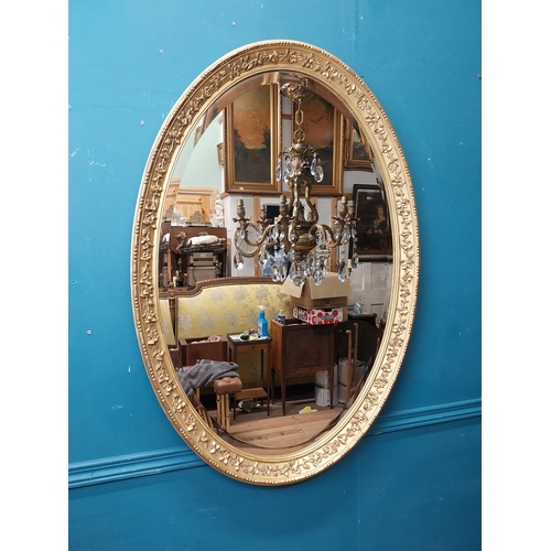 956 - 19th C. gilt oval wall mirror. {96 cm H x 68 cm W}.