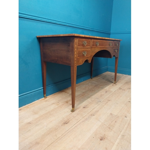 957 - Edwardian mahogany and satinwood desk raised on square tapered legs and brass castors {80 cm H x 129... 