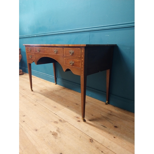 957 - Edwardian mahogany and satinwood desk raised on square tapered legs and brass castors {80 cm H x 129... 