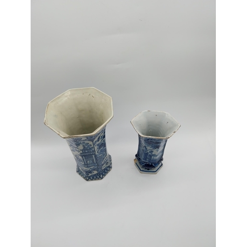 967 - Two 19th C. blue and white vases. {30 cm H x 16 cm D] and {23 cm H x 14 cm W x 10 cm D}.