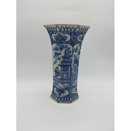 967 - Two 19th C. blue and white vases. {30 cm H x 16 cm D] and {23 cm H x 14 cm W x 10 cm D}.