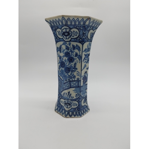 967 - Two 19th C. blue and white vases. {30 cm H x 16 cm D] and {23 cm H x 14 cm W x 10 cm D}.