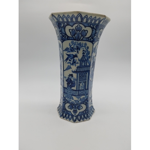 967 - Two 19th C. blue and white vases. {30 cm H x 16 cm D] and {23 cm H x 14 cm W x 10 cm D}.