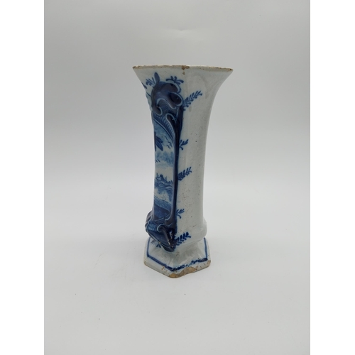 967 - Two 19th C. blue and white vases. {30 cm H x 16 cm D] and {23 cm H x 14 cm W x 10 cm D}.