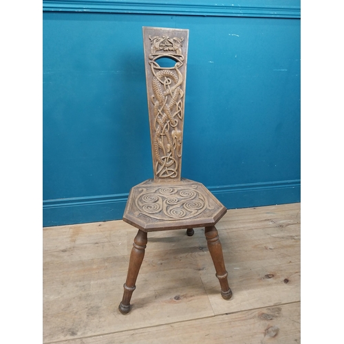 968 - Celtic carved oak spinning chair {90 cm H x 36 cm W x 40 cm D}.