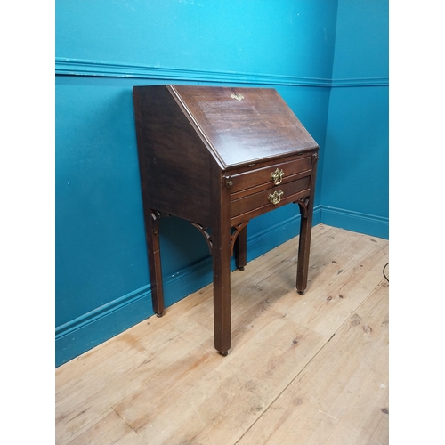 969 - Irish mahogany bureau with fitted interior and two drawers raised on square legs and castors {94 cm ... 