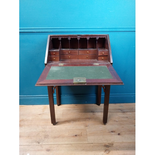 969 - Irish mahogany bureau with fitted interior and two drawers raised on square legs and castors {94 cm ... 