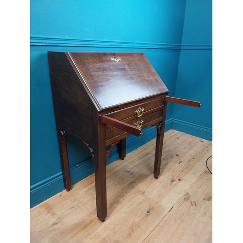 969 - Irish mahogany bureau with fitted interior and two drawers raised on square legs and castors {94 cm ... 