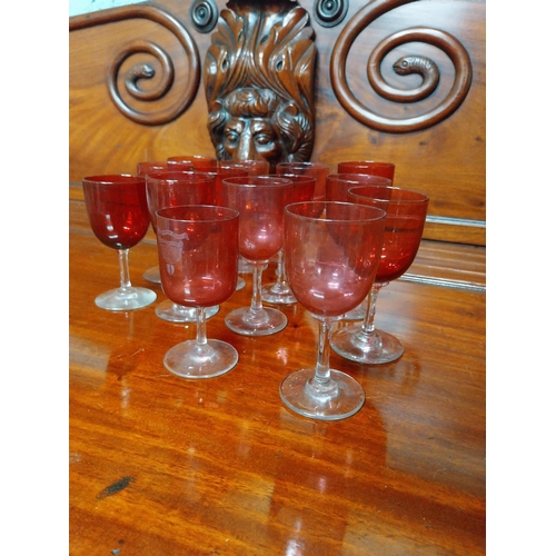 970 - Twelve 19th C. ruby glasses. {13 cm H x 6 cm Dia.}.