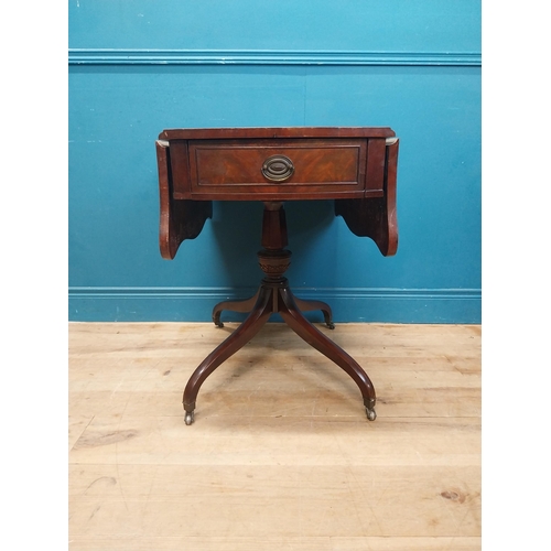 973 - Walnut drop leaf centre table with leather top raised on carved column, four outswept feet and casto... 