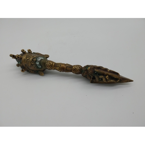 974 - Decorative bronze oriental dagger. {32 cm H x 7 cm W x 7 cm D}.