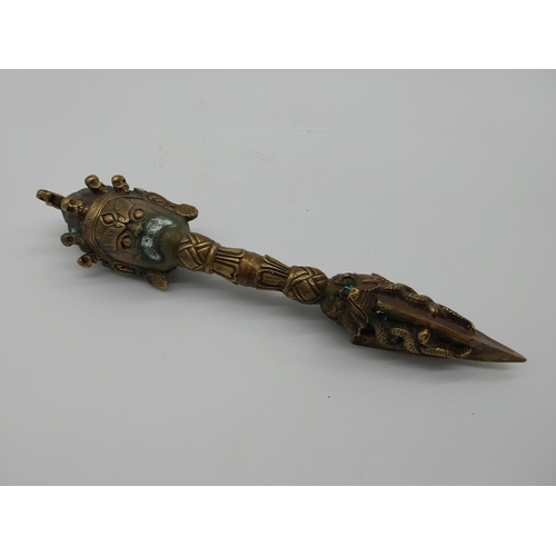 974 - Decorative bronze oriental dagger. {32 cm H x 7 cm W x 7 cm D}.