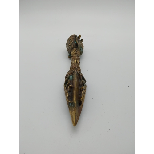 974 - Decorative bronze oriental dagger. {32 cm H x 7 cm W x 7 cm D}.