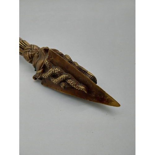 974 - Decorative bronze oriental dagger. {32 cm H x 7 cm W x 7 cm D}.