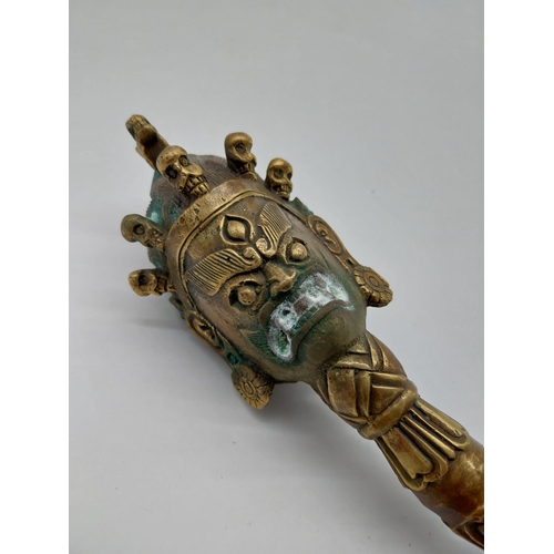 974 - Decorative bronze oriental dagger. {32 cm H x 7 cm W x 7 cm D}.