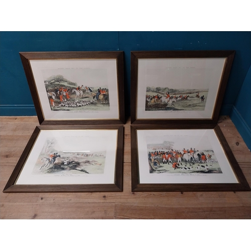 978 - Set of four coloured Hunting prints mounted in wooden frames {76 cm H x 92 cm W}.