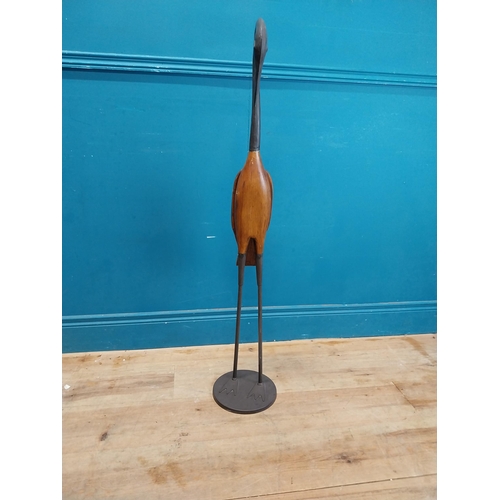 983 - Wooden and metal model of a Stork {104 cm H x 21 cm Dia.}.