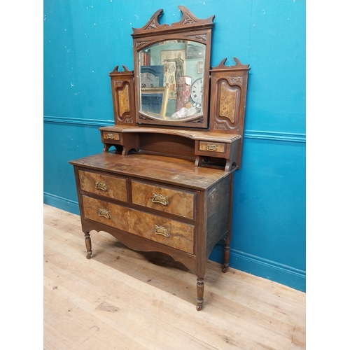 985 - Edwardian walnut dressing table with two short drawers above one long drawer raised on turned legs a... 