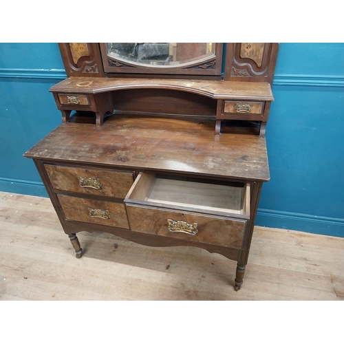 985 - Edwardian walnut dressing table with two short drawers above one long drawer raised on turned legs a... 