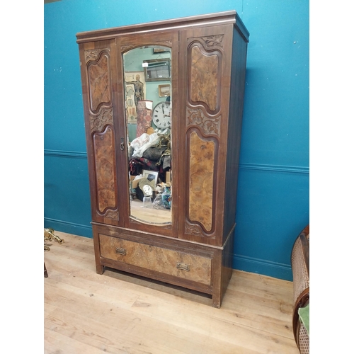 986 - Edwardian walnut wardrobe with mirrored door above one long drawer {200 cm H x 114 cm W x 45 cm D}.