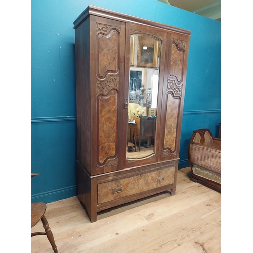 986 - Edwardian walnut wardrobe with mirrored door above one long drawer {200 cm H x 114 cm W x 45 cm D}.