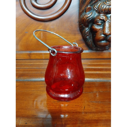 990 - Five pieces of 19th C. ruby glass jugs and vases.