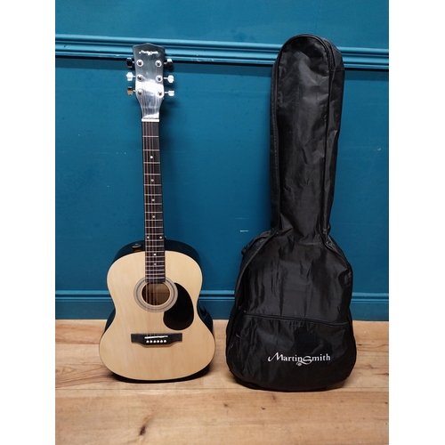 995 - Martin Smith 6 string acoustic Guitar with material case {104 cm H x 40 cm W x 10 cm D}.