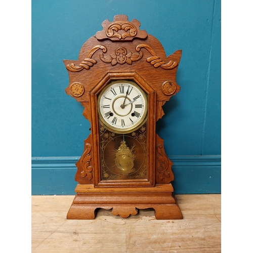 999 - Early 20th C. oak gingerbread clock. {60 cm H x 37 cm W x 14 cm D}.