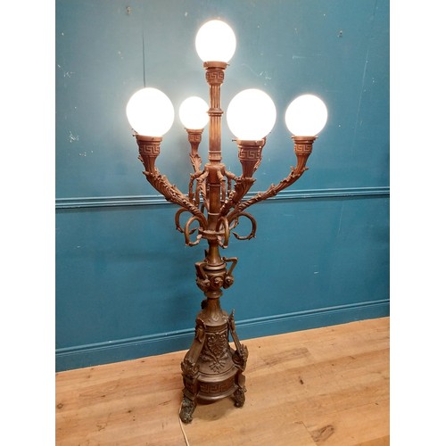 1002 - Pair of decorative bronze floor candelabras with opaline glass shades {174 cm H x 75 cm Dia.}.