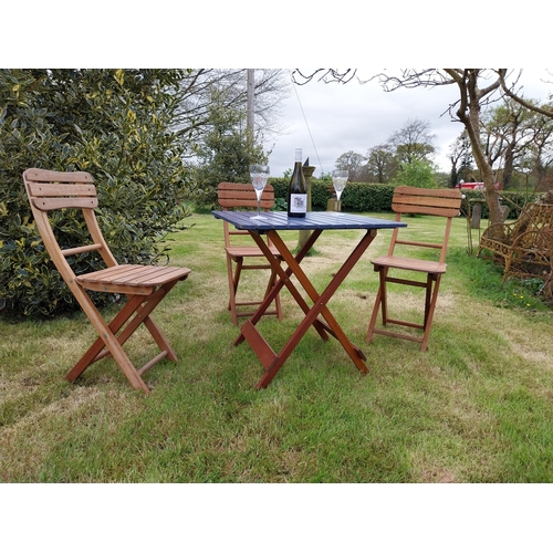 10 - Good quality teak folding garden table with three matching garden chairs {Tbl. 71 cm H x 68 cm W x 6... 