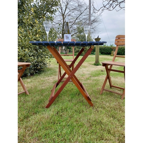 10 - Good quality teak folding garden table with three matching garden chairs {Tbl. 71 cm H x 68 cm W x 6... 