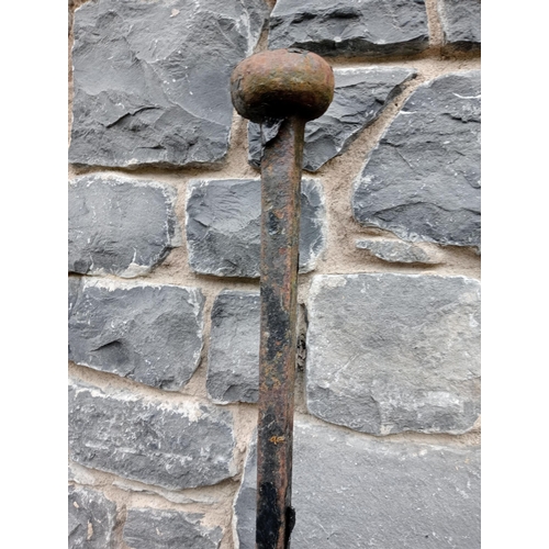 1000A - Wrought iron foot scraper {H 168cm x W 20cm x D 37cm }.