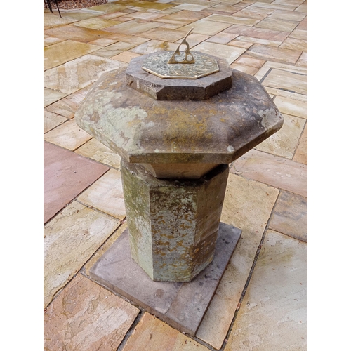 1020 - Sandstone and brass hexagon top sundial {H 75cm x D 30cm}.