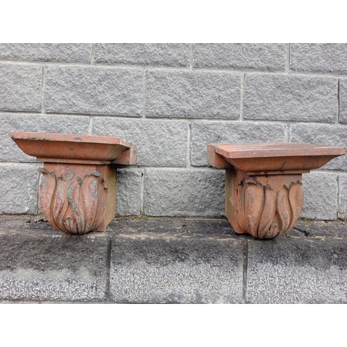 1030 - Pair of terracotta pillar caps {H 365cm x W 32cm x D 46cm }.