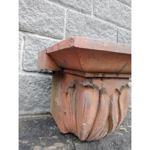 1030 - Pair of terracotta pillar caps {H 365cm x W 32cm x D 46cm }.