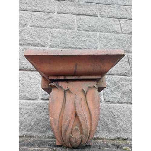 1030 - Pair of terracotta pillar caps {H 365cm x W 32cm x D 46cm }.