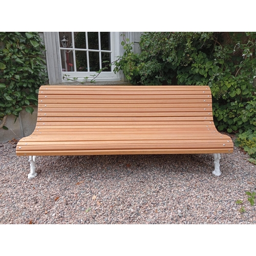 111 - Cast iron and wooden rolltop garden bench {H 75cm x W 180cm x D 70cm }.