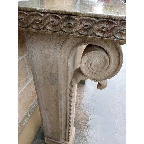 115 - Sandstone chimney piece with scroll and corbel design{H 120cm x W 140cm x D 45cm }.