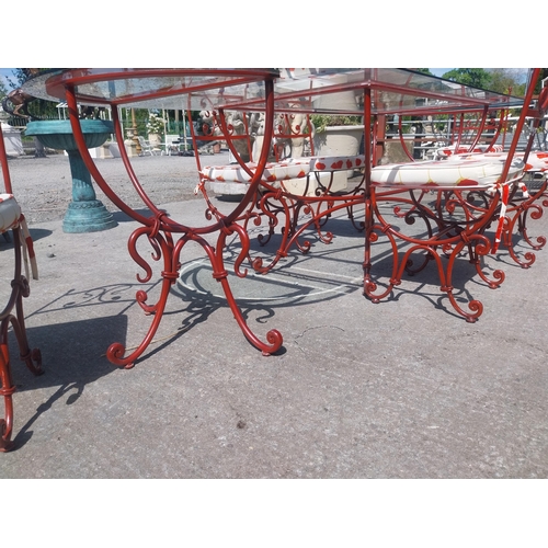 128 - Good quality wrought iron garden table with glass top and detachable d-ends and six matching chairs ... 