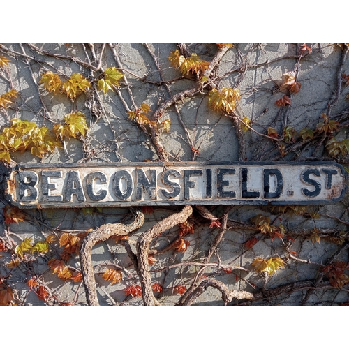 131 - Cast iron Street sign Beaconsfield St {H 13cm x W 102cm }.