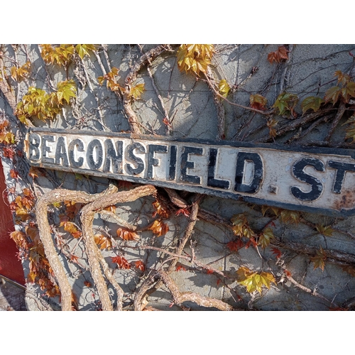 131 - Cast iron Street sign Beaconsfield St {H 13cm x W 102cm }.