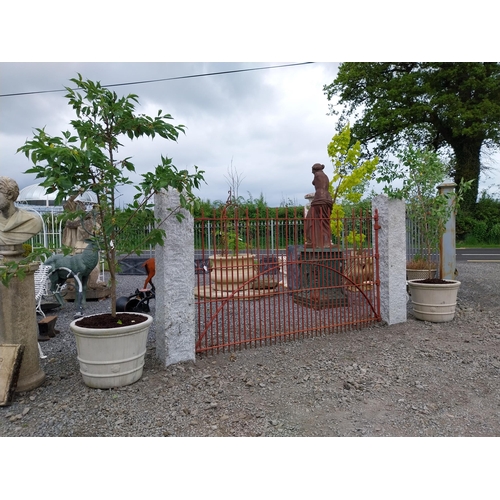 134 - Pair of good quality moulded sandstone planters with trees {Planters 53 cm H x 66 cm Dia.}.