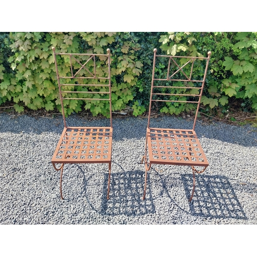 154 - Pair of wrought iron high back garden chairs {114 cm H x 44 cm W x 44 cm D}.