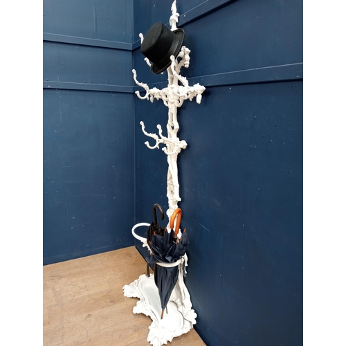 159 - Victorian cast iron coat rack and umbrella stand in the form of a tree  {H 204cm x W 45cm x D 26cm}.