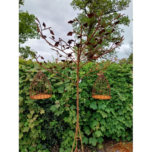 160 - Decorative wrought iron bird feeder in the form of a tree and two hanging bird cages {224 cm H x 135... 