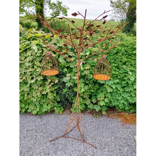 160 - Decorative wrought iron bird feeder in the form of a tree and two hanging bird cages {224 cm H x 135... 