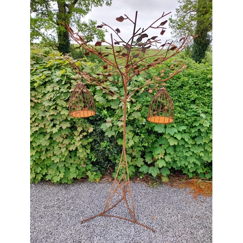 160 - Decorative wrought iron bird feeder in the form of a tree and two hanging bird cages {224 cm H x 135... 