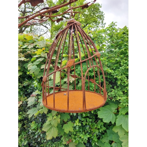 160 - Decorative wrought iron bird feeder in the form of a tree and two hanging bird cages {224 cm H x 135... 